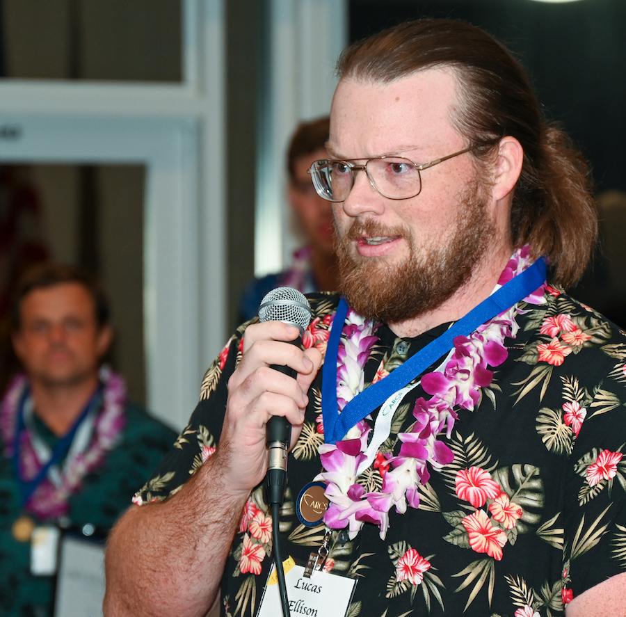 Ellison Lucas speaking into microphone