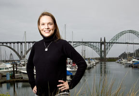 Kelly Benoit-Bird with bridge and boats in background