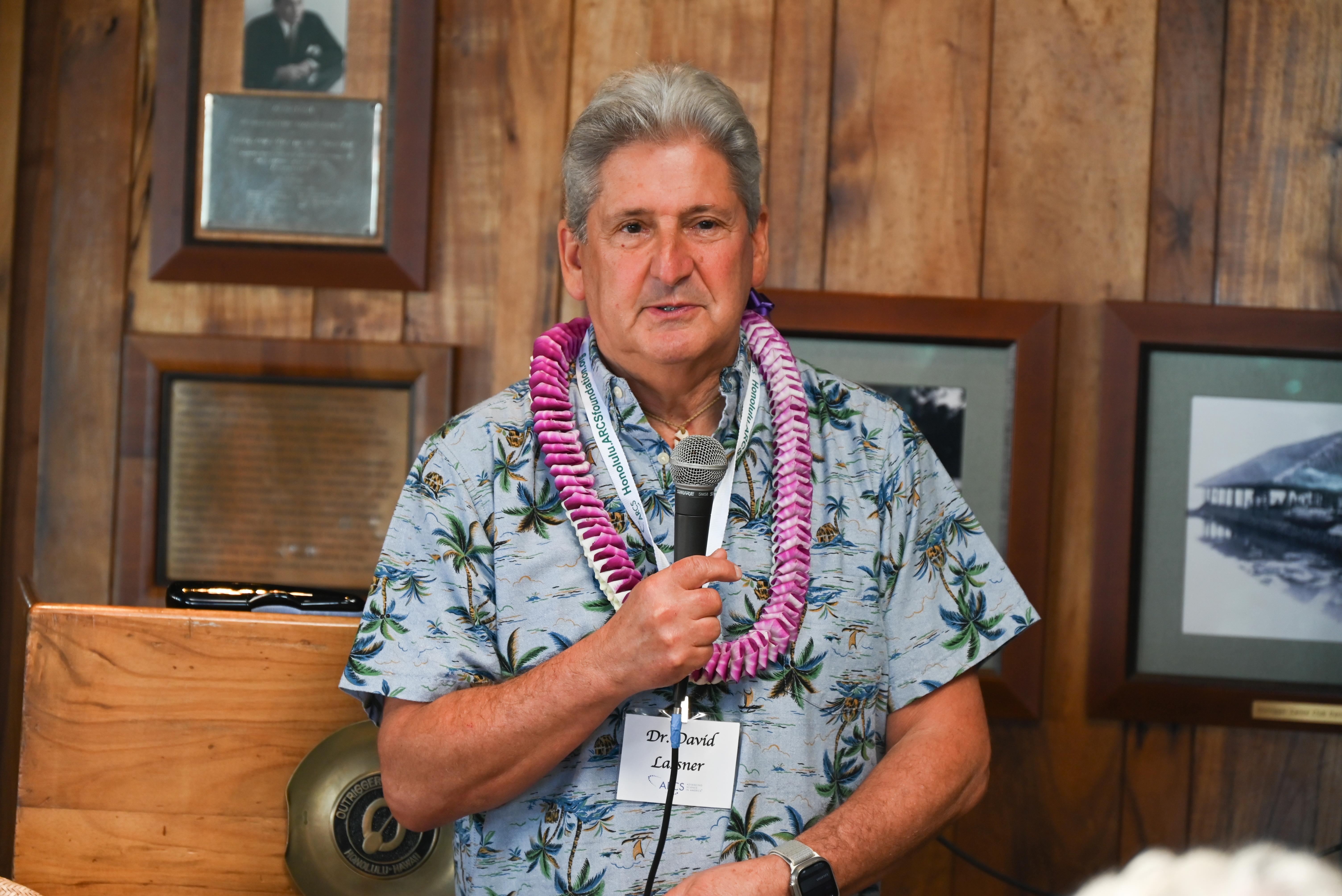 Dr. David Lassner with microphone