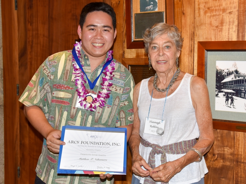Matthew Nakamura with certificate