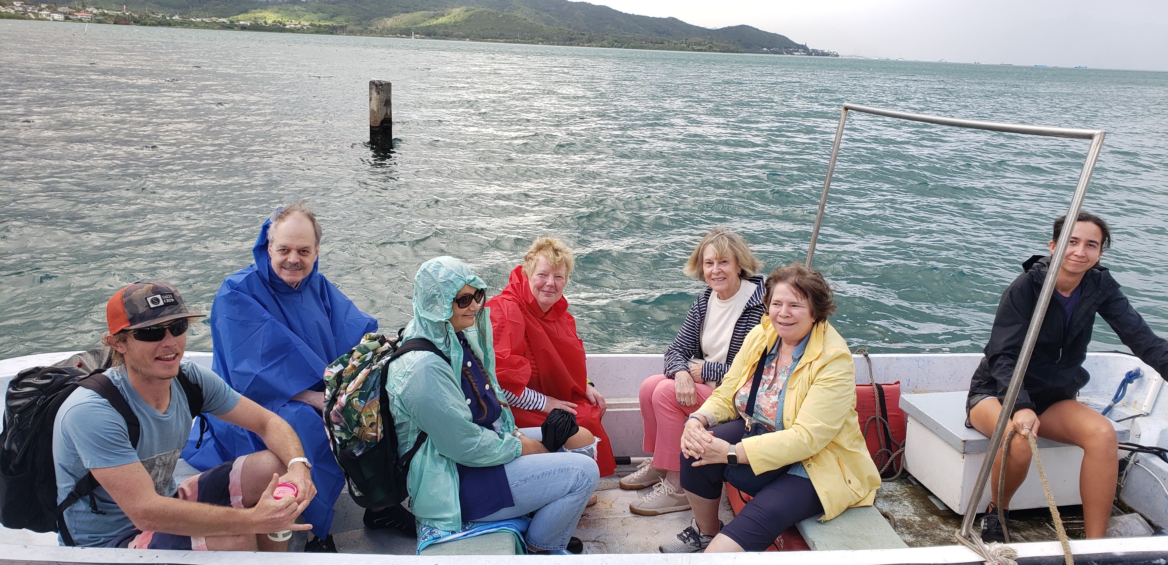 Tour participants in outboard motor boat